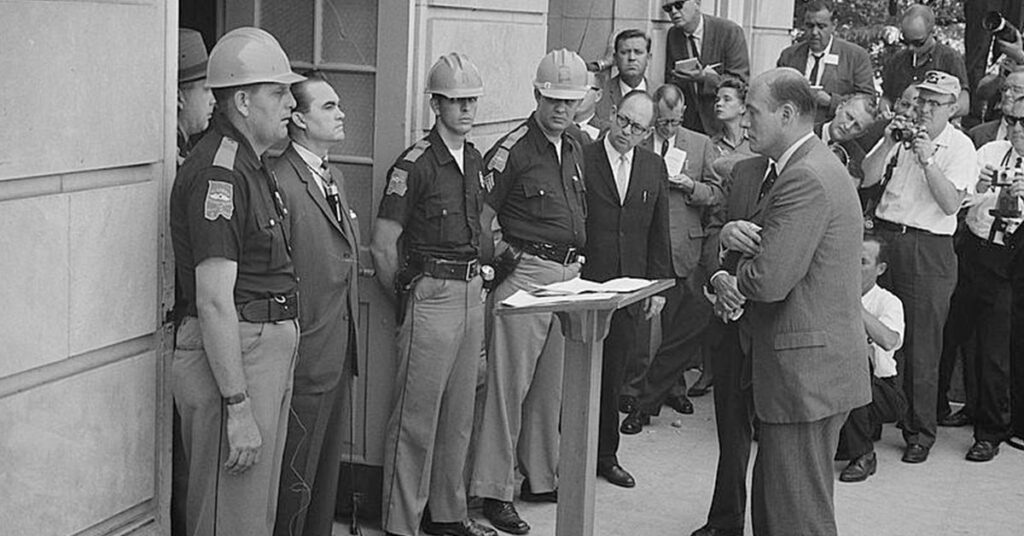 Governor George Wallace attempting to block integration at the University of Alabama.
